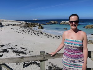 Sonia posing with the penguins on the viewing deck