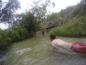Rich swimming through the creek