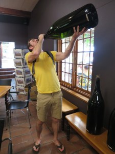 Rich drinking from a Solomon (holds 26 bottles of wine)