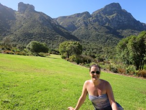 Sonia relaxing on the lawn with Table Mountain in the background