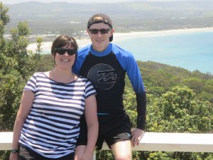 Bec and Tom with Byron Bay's beach in the background
