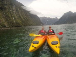 Rich and Sonia kayaking in Milford Sound