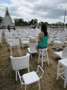 The 185 chairs installation is behind the new cathedral building