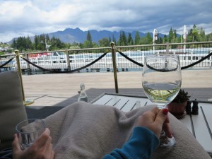 Keeping warm with a blanket whilst enjoying wine and a view of The Remarkables