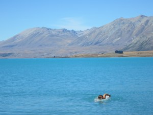 Rich taking a swim in the freezing cold glacial water of Lake Tekapo