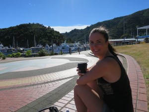 Sonia enjoying a morning coffee in the sunshine at Picton harbour