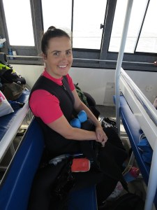 Sonia in her wetsuit eager to swim with dolphins!