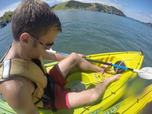 Rich looking through the glass bottom porthole in search of stingray