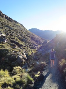 Sonia shielding her eyes from the rising sun