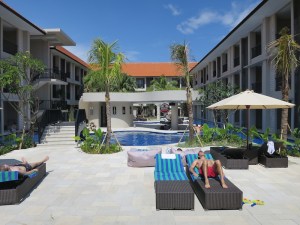Sunbathing by the lagoon pool