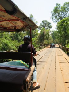 Crossing the bridge in our tuk tuk on the way to Ta Phrom