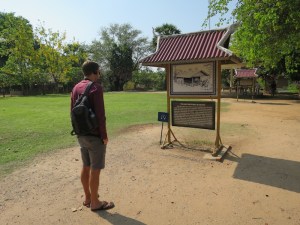 Rich listening to the audio tour at Choeung Ek