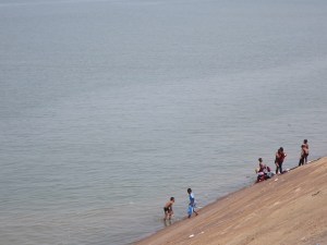 Playing in the river to escape the heat