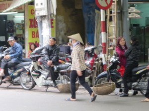 One of many street sellers who would carry fruit and veg for sale
