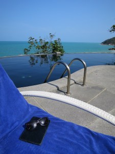 Everything needed for the afternoon in one place, sunglasses, kindle, sun lounger and pool!