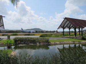 The open plan airport where you can see the planes land right by the departure lounge