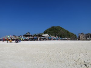 The beach on Khai island was lined with bar shacks