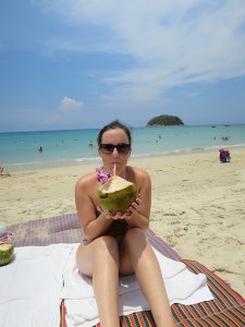 Sonia enjoying coconut milk on Kata beach