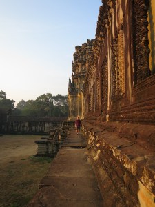 Rich walking along the inner walls of Angkor Wat