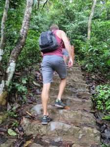Rich walking up steps through Cat Ba Island National Park