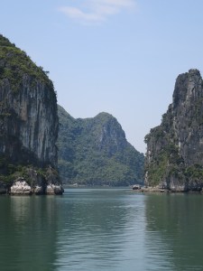 The soaring limestone cliffs made the junk boats look tiny in comparison