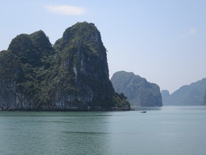 Majestic islands and tiny rowing boats make for a beautiful photo