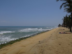 Cua Dai beach being held together by sand bags following erosion by the sea