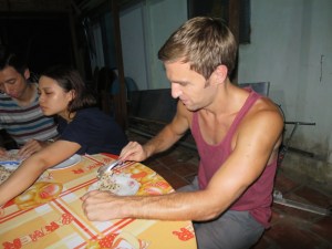 Rich preparing spring rolls