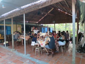 Everyone eating breakfast at Mr Hung's homestay