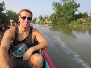 Rich enjoying the morning ride in Mr Hung's boat